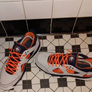 Stylish Athletic Shoes with Orange Accents